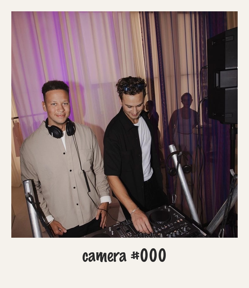 The duo at the booth — camera #000