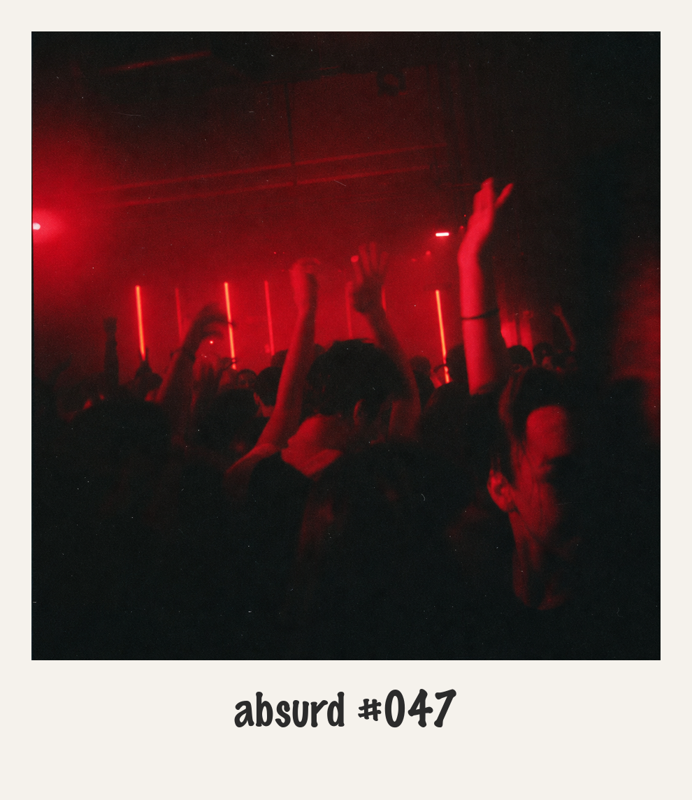 Red-lit crowd — absurd #047